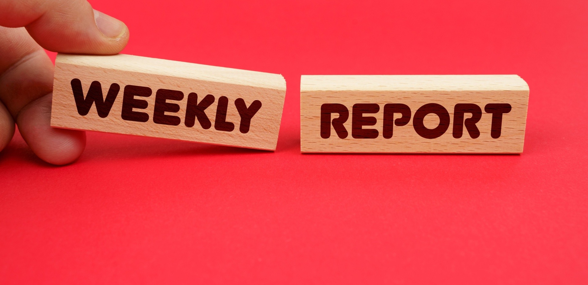 Blocks saying weekly report 