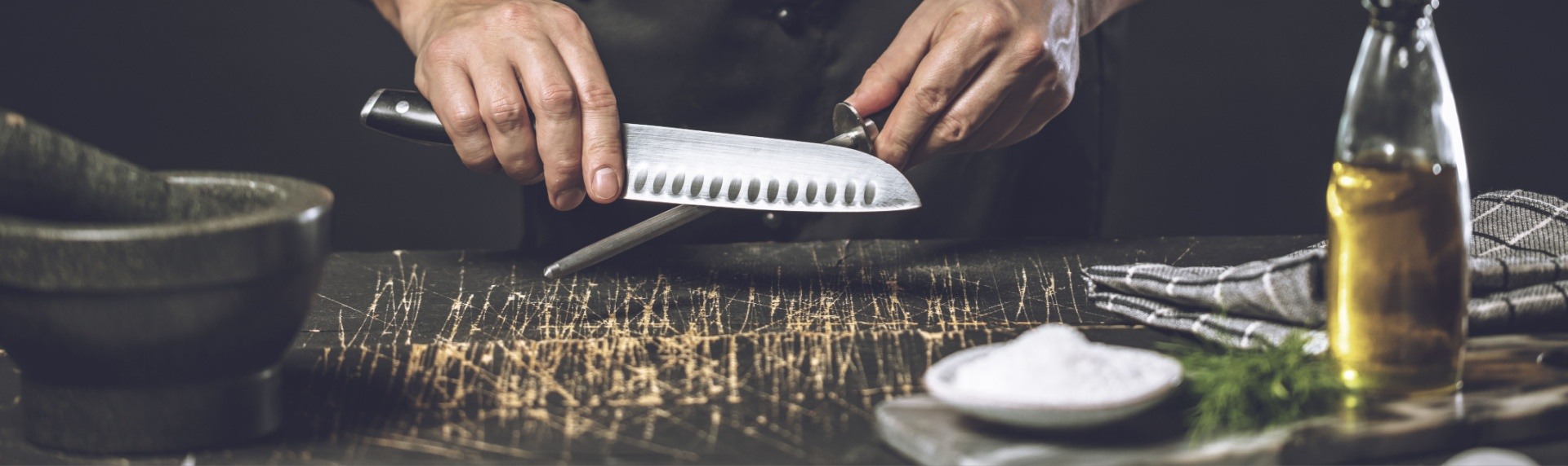 Man sharpening his knife 