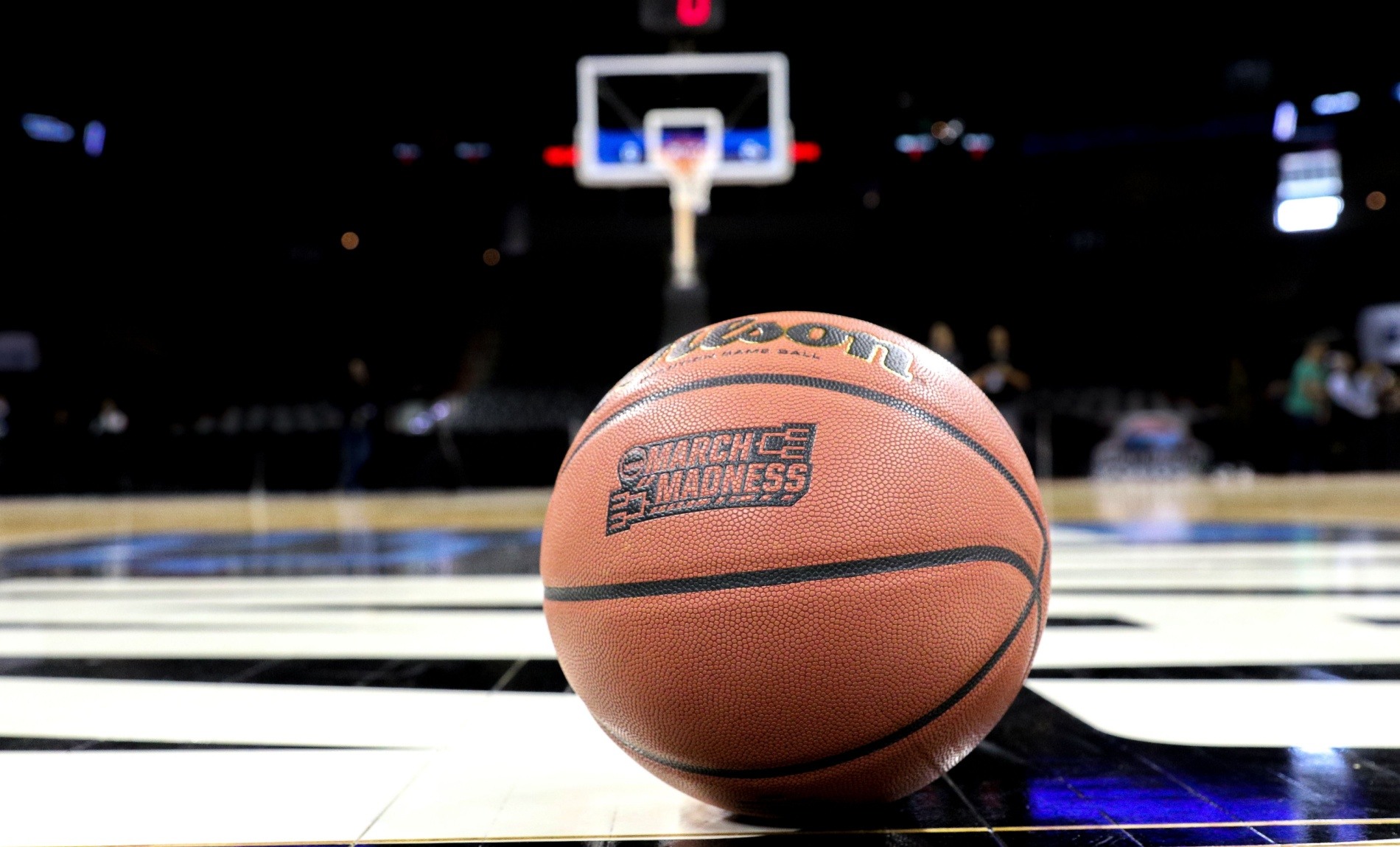 march madness basketball on court
