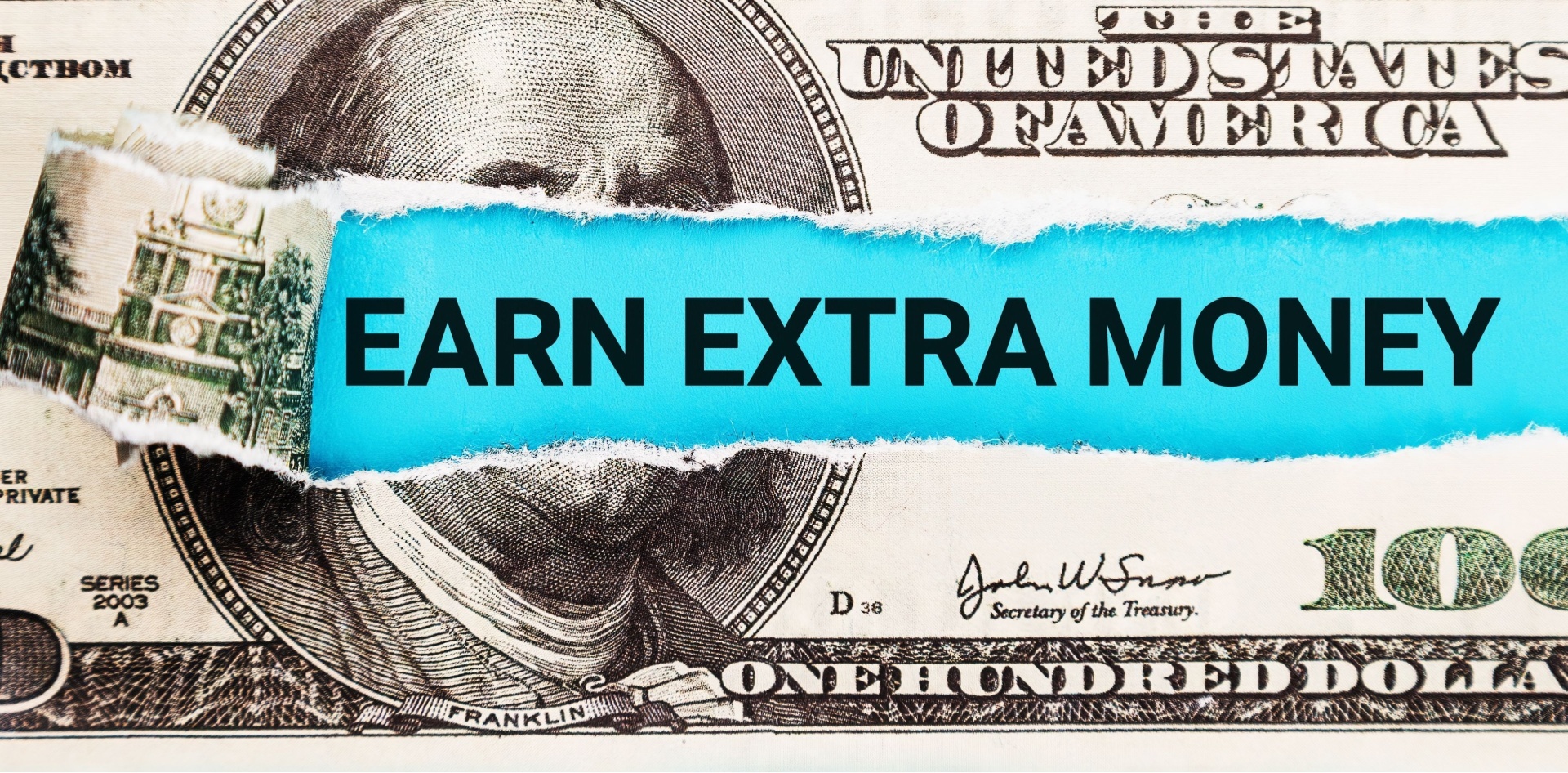 Money with a tear in it saying earn extra money