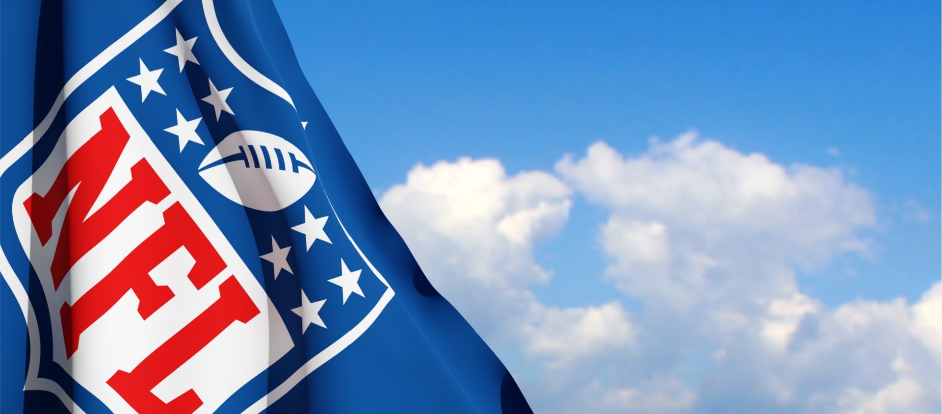 NFL flag with sky in the background