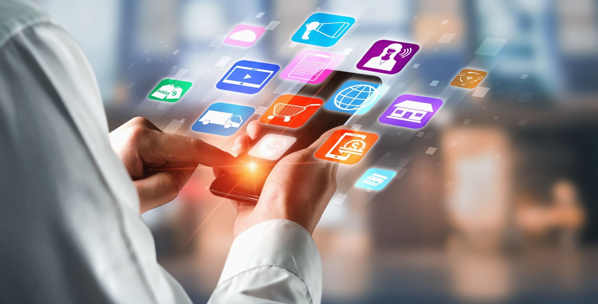 Image of a futuristic phone showing a hologram of apps in their phone