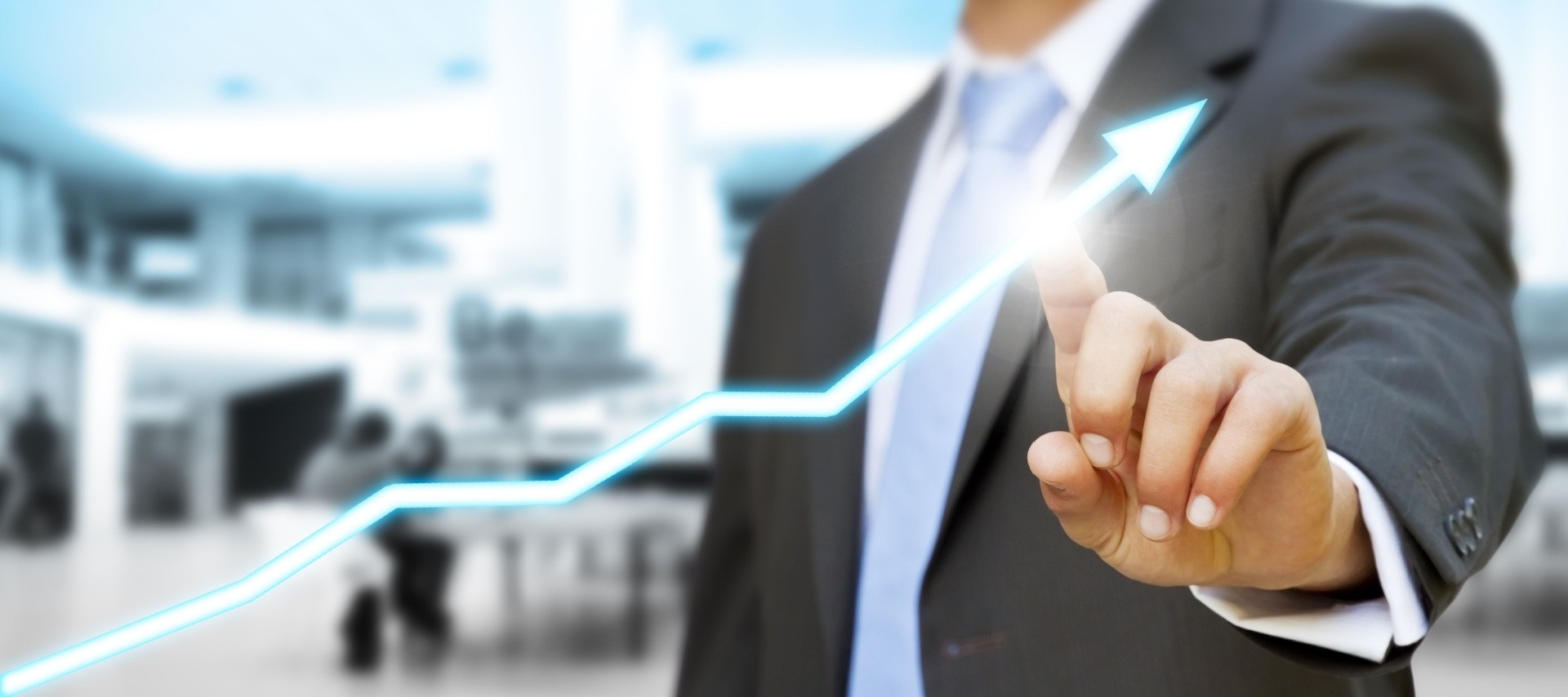 man touching an upwards arrow. 