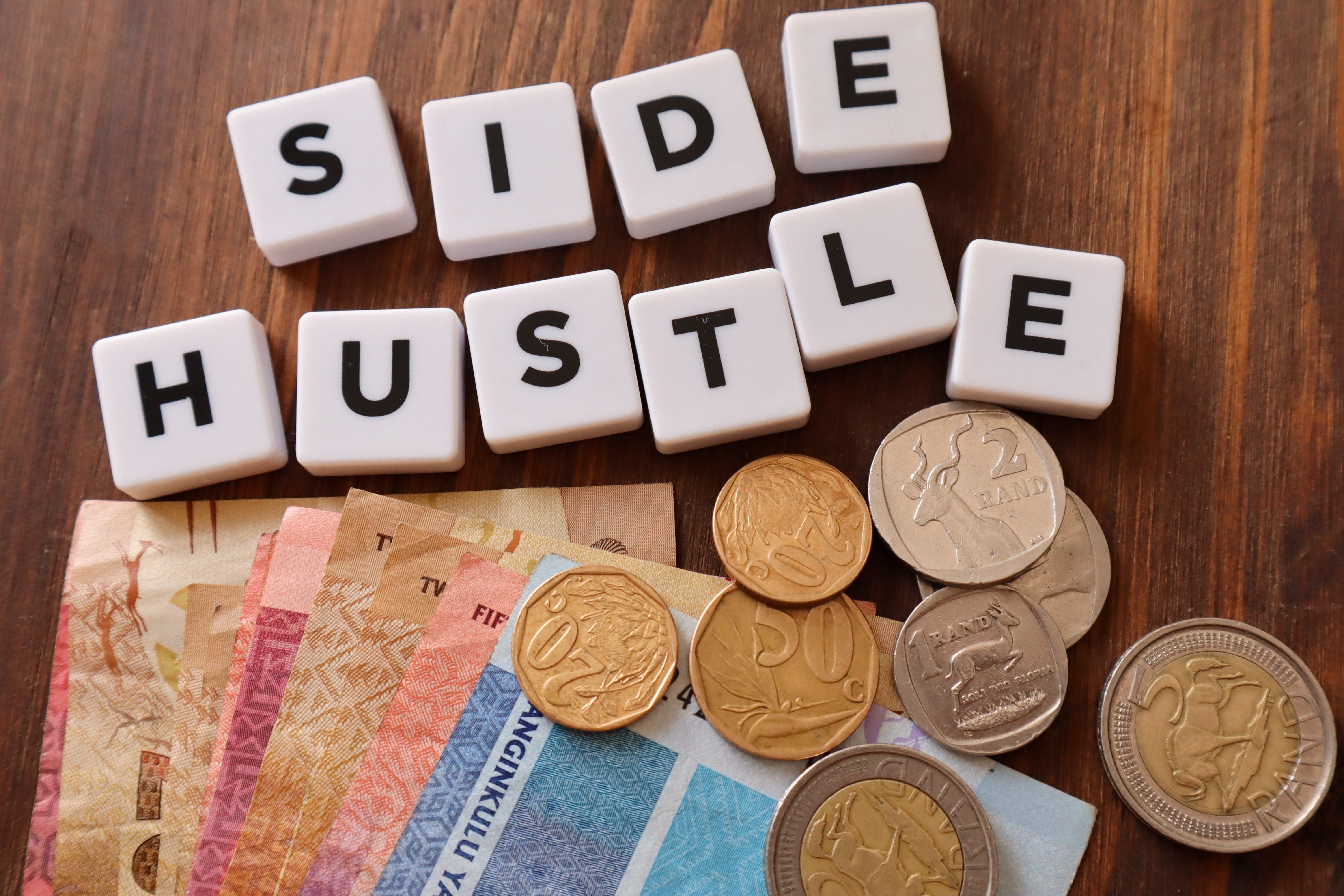 Side hustle graphic with coins and notes