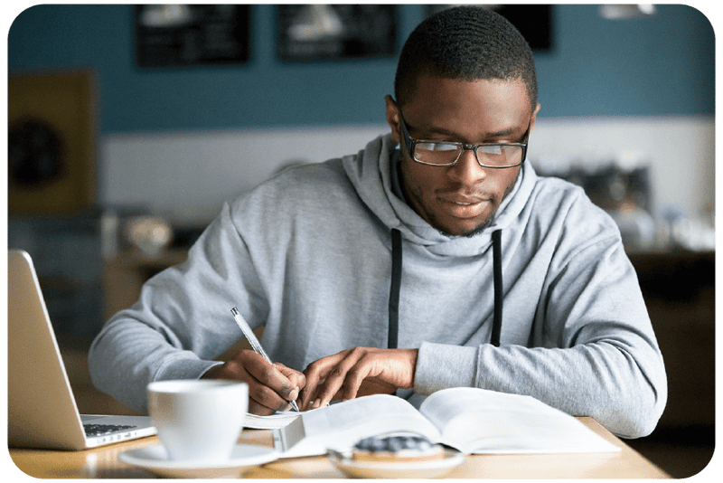 student writing out work