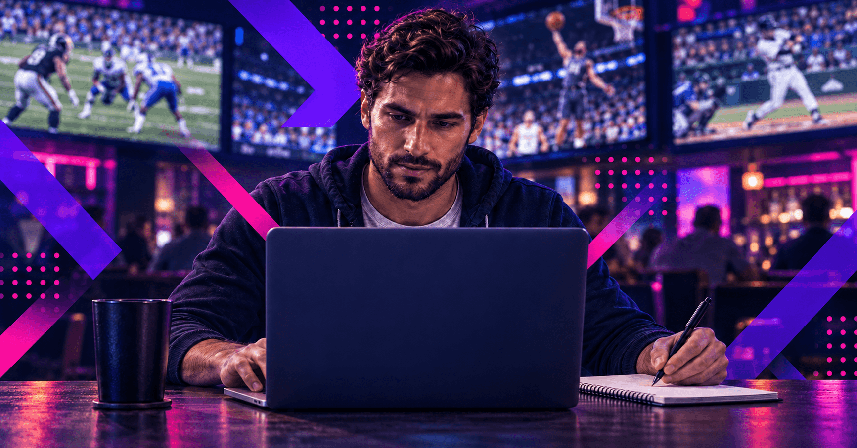 male using laptop to find the best Sports Betting Tools and Software