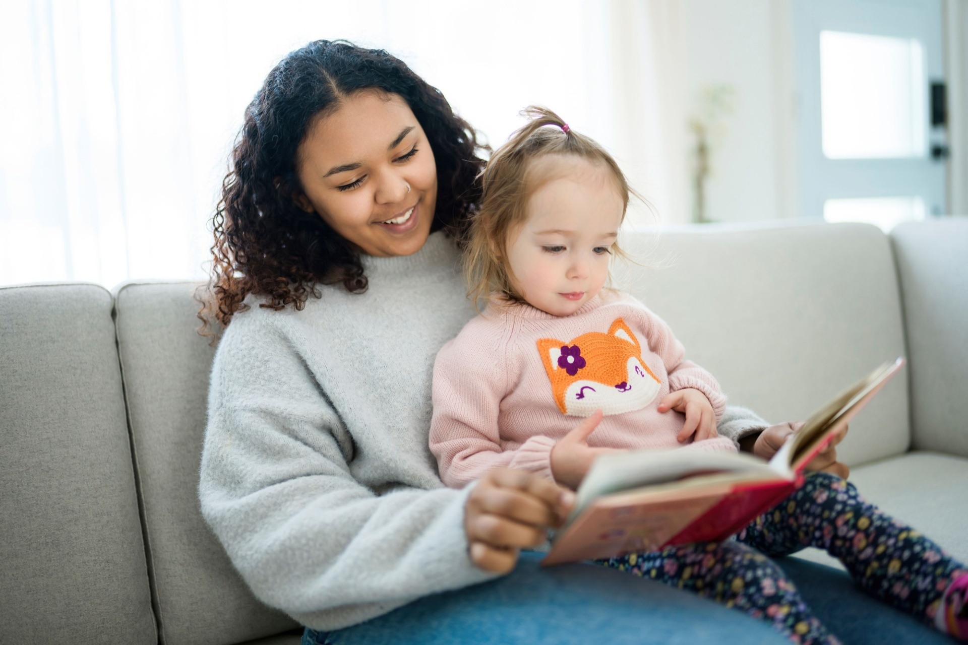 woman sat with baby